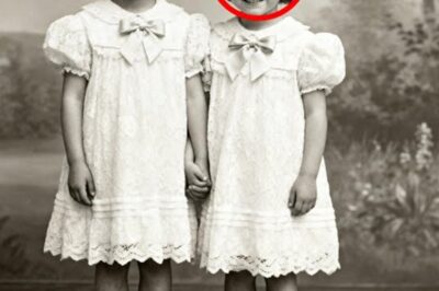 This 1919 Studio Portrait of Two “Twins” Looks Cute Until You Notice The Shoes
